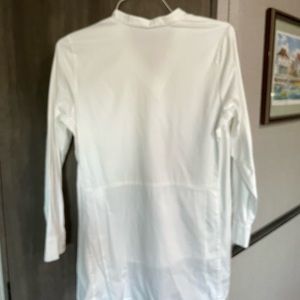 A large white shirt, with a long back.